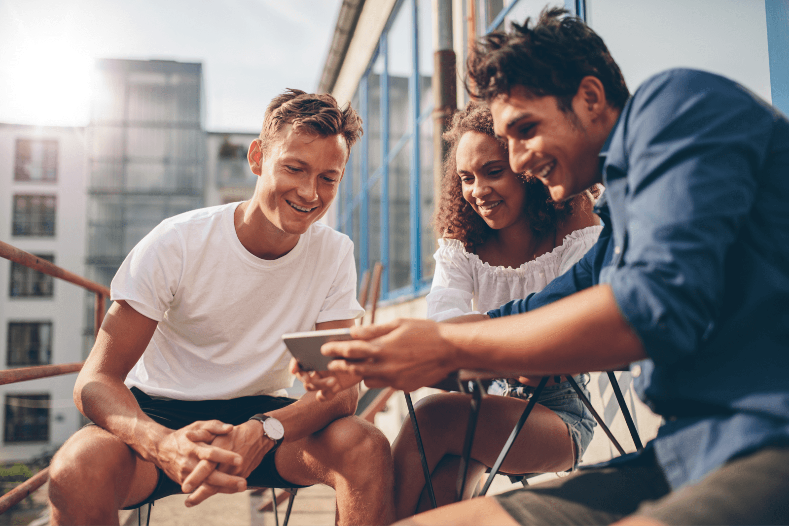 Group of People Watching Video on the Mobile Phone 1